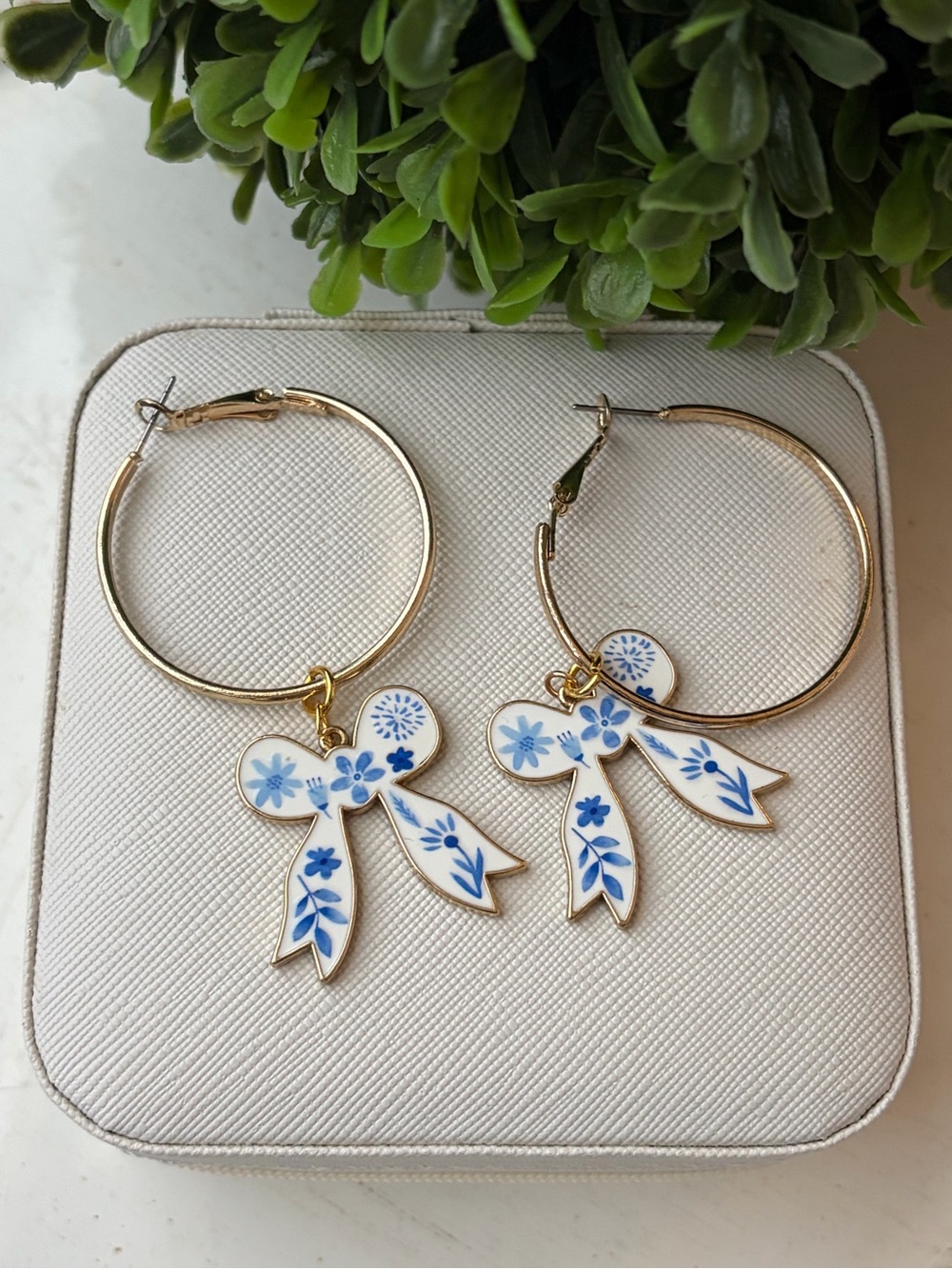Gold Hoop Earrings with Blue Floral Bow Charms